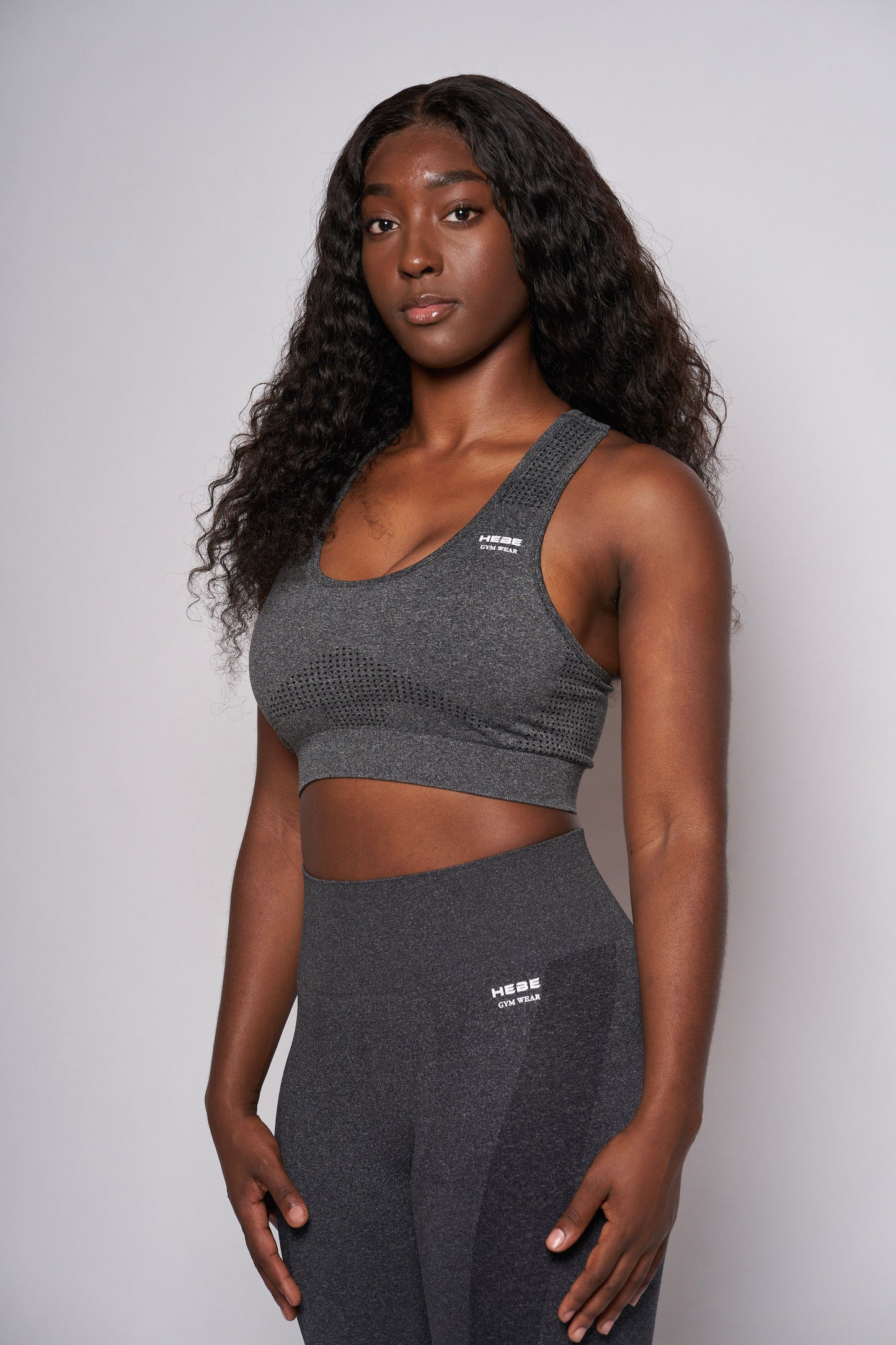 girl in grey hebe gymwear matching bra top and leggings