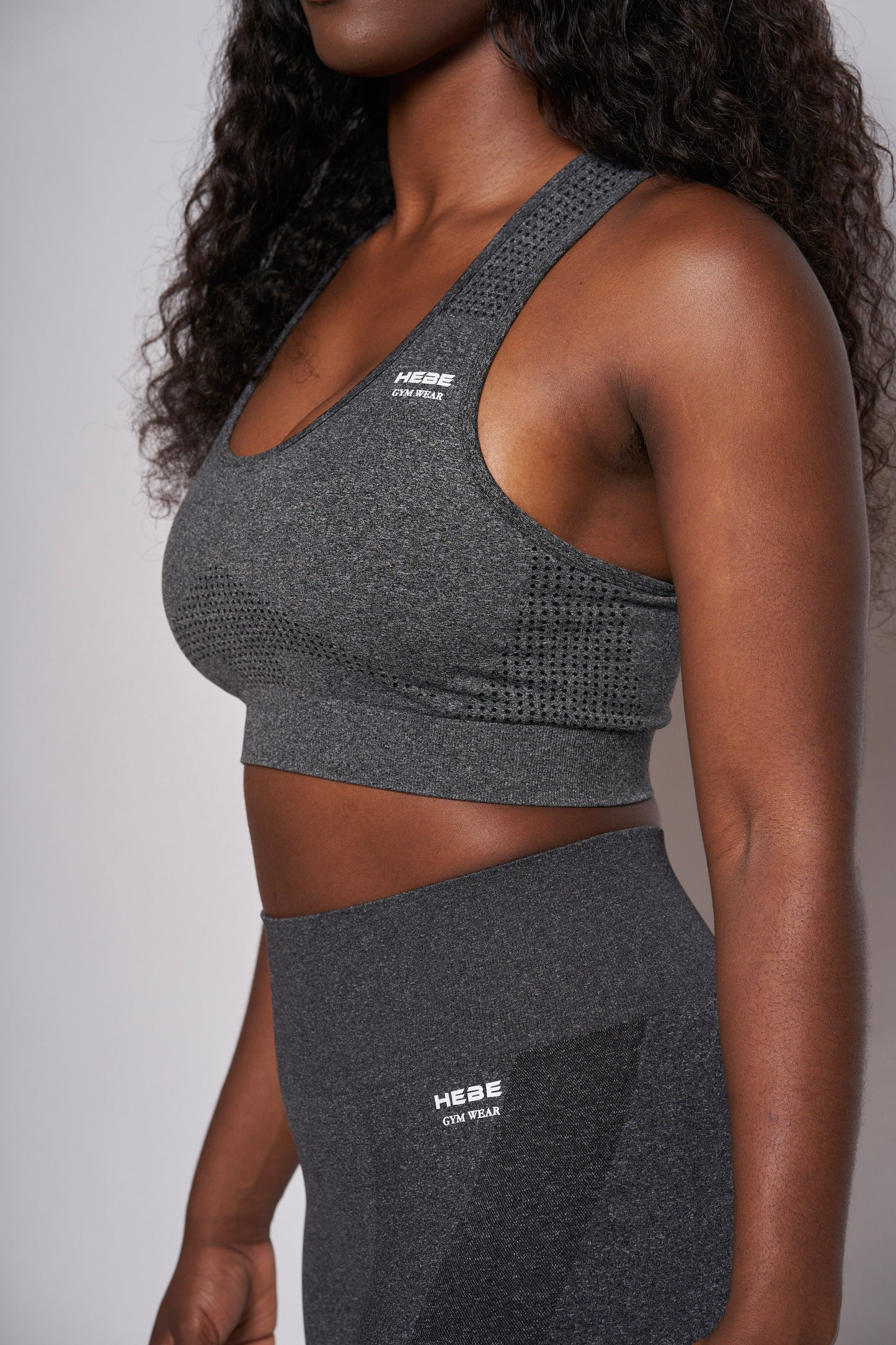 girl in grey hebe gymwear matching bra top and leggings