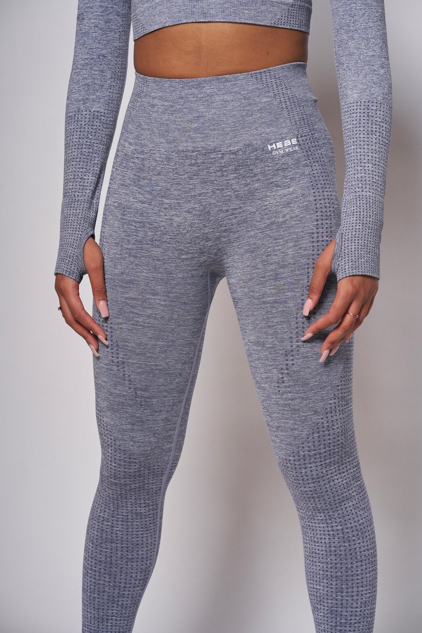 close up of grey gymwear leggings