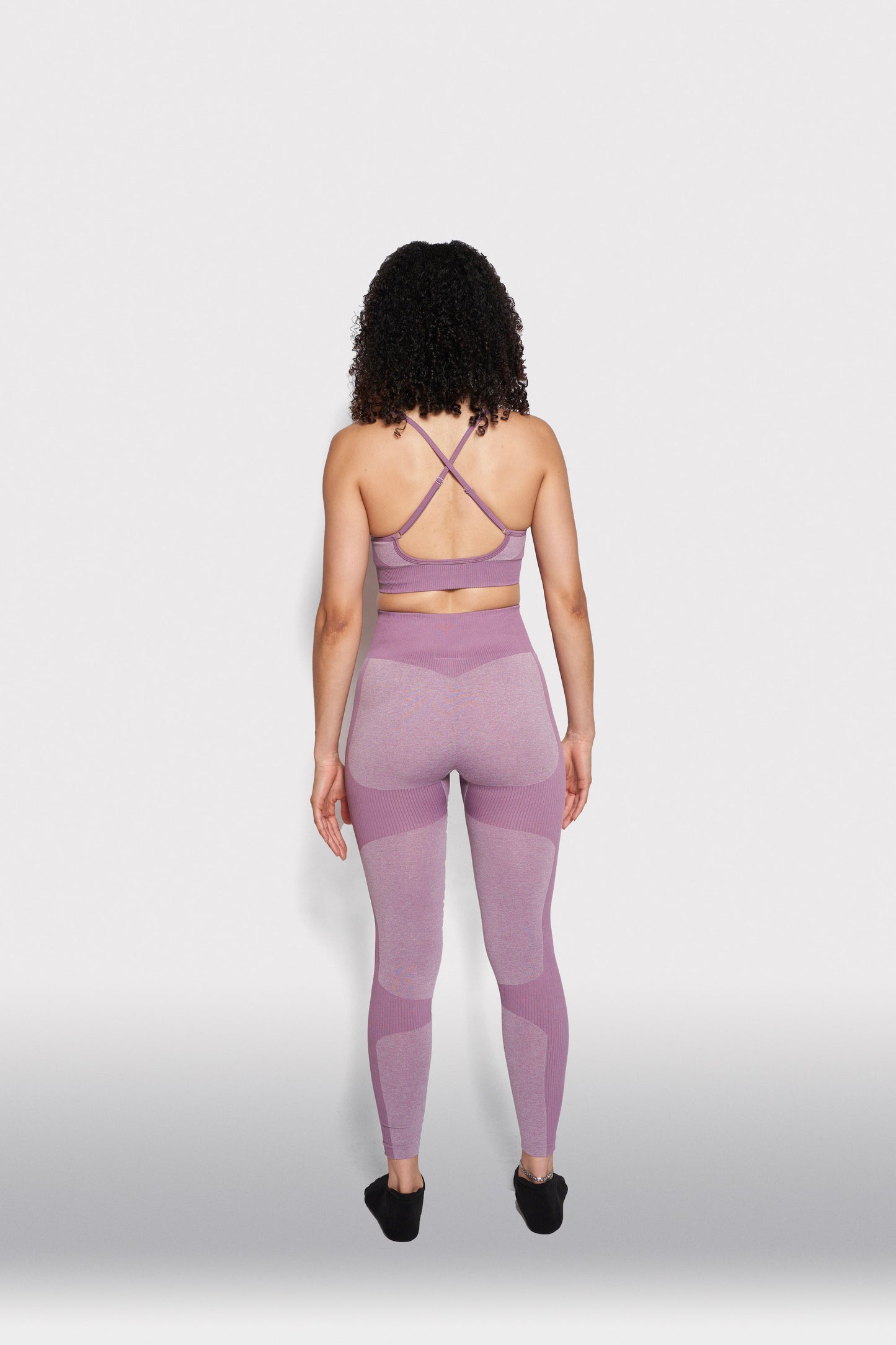 back view of girl wearing purple gymwear