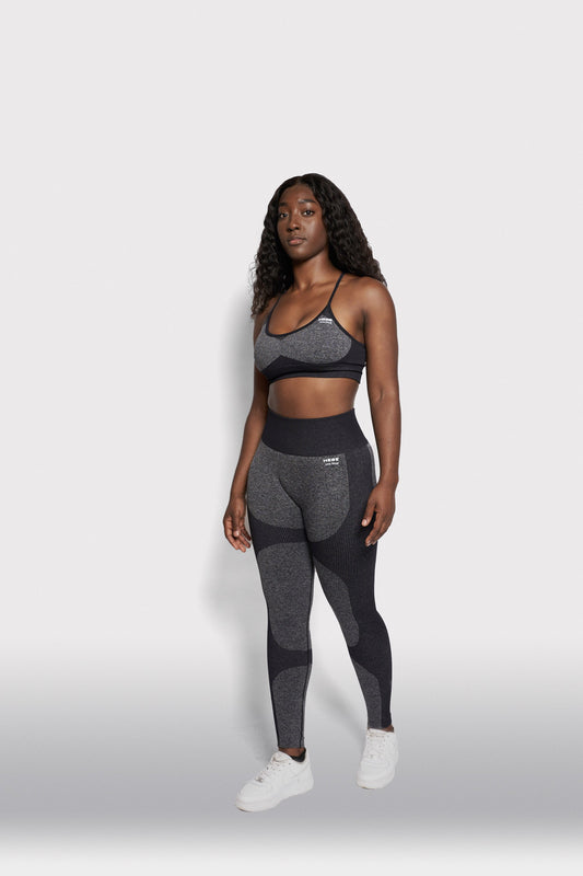 black girl wearing grey gym outfit